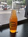 A glass bottle of Jarritos Tamarindo using a bottle design found in Mexico