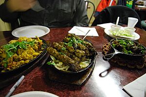 Pakistani gobi aloo, seekh kebab, and beef karahi