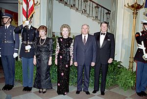 President Ronald Reagan, Nancy Reagan, Raisa Gorbachev, and Mikhail Gorbachev in Cross Hall before a state dinner for the Washington Summit