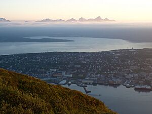 Tromssa and mountains in midnight sun