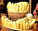 Baguettes stall, Dschang, Cameroon (cropped) - Talapapa bread.jpg