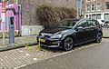 Black VW Golf GTE charging fl, Amsterdam (20150224 102438)