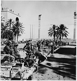 British tanks and crews line up on Tripoli's waterfront after capturing the city. - NARA - 196346