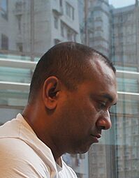 A serious-looking Firoz Mahmud in profile