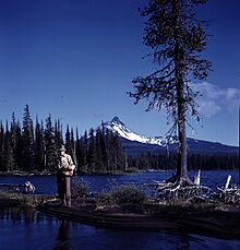 Fishing in Big Lake on the Santiam Highway near Mt. Washington (cropped)