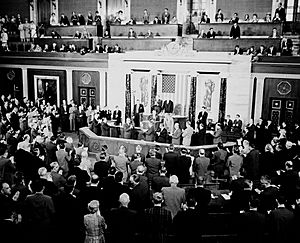 Gordon Cooper and Pete Conrad receive a standing ovation from U.S. House