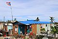 House with blue tarp after Hurricane Maria in Dorado, Puerto Rico