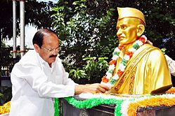 M. Venkaiah Naidu garlanding the statue of Pingali Venkayya (Freedom fighter and the designer of the flag on which the Indian national flag was based), at Pingali Venkayya AIR Station, in Vijayawada