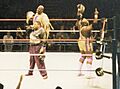 MOM win tag titles