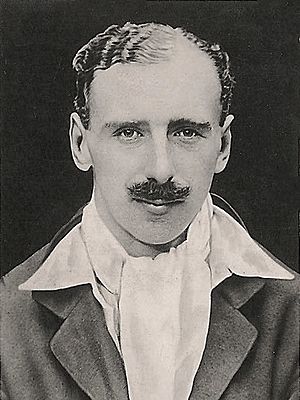 Headshot of a moustached man
