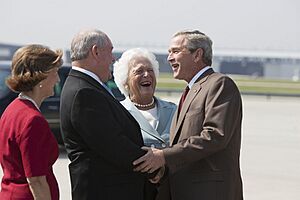 President George W. Bush and Barbara Bush are greeted by Georgia Governor Sonny Perdue