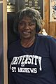 Renee Powell with image of her father, Bill (cropped)