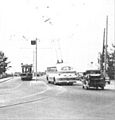 Streetcar and trolleybus cross Calgary's Louise Bridge in 1947