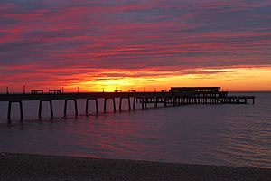 Sunrise over Deal Pier by Dr Alex Kent