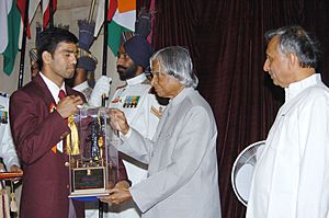 The President Dr. A.P.J. Abdul Kalam presenting the Arjuna Award -2005 to Shri Akhil Kumar for Boxing, at a glittering function in New Delhi on August 29, 2006. The Union Sports Minister Shri Mani Shankar Aiyar is also seen.jpg