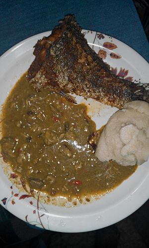 Tuwo with miyan kuka and fried fish.jpg