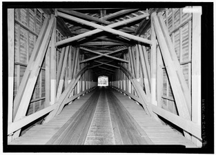 VIEW OF INTERIOR FROM SOUTHEAST. - Jackson Covered Bridge, Spanning Sugar Creek, CR 775N (Changed from Spanning Sugar Creek), Bloomingdale, Parke County, IN HAER IND,61-BLOMD.V,1-7