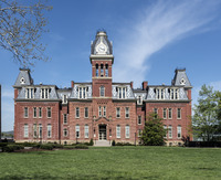 Woodburn Hall, first known as University Hall, is the central and dominating building of Woodburn Circle, a group of buildings on the downtown campus of West Virginia University in Morgantown LCCN2015631550