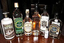 A Selection of Legal Irish and Celtic Poitin or Poteen Bottles Taken in a Poitin Bar.jpg