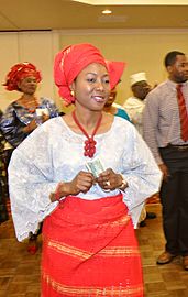 A Yoruba woman garbed in traditional clothing