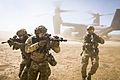 A joint special forces team moves together out of an Air Force CV-22 Osprey aircraft, Feb. 26, 2018