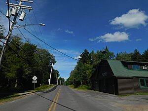 Herkimer County Route 1 southbound at the Big Moose fire station.