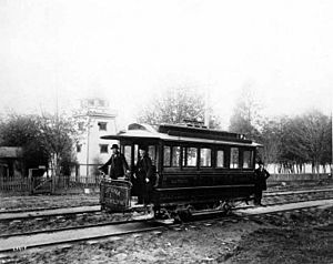 Car -1 of the Rainier Power and Railway Co near south end of Lake Union, Seattle, with investor David T Denny (CURTIS 1129)