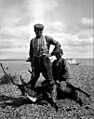 Eskimos with reindeer, Iliamna Lake, Alaska, July 26, 1917 (COBB 138)