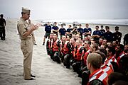 US Navy 070720-N-0696M-178 Chief of Naval Operations (CNO) Adm. Mike Mullen prepares to secure students of Basic Under Water Demolition Seal Training (BUDS) Class 266 from the Hell Week portion of their training