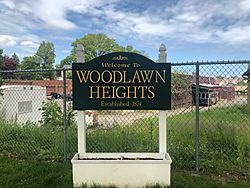 "Welcome to Woodlawn Heights" sign.