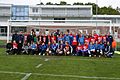 Ambassador Murphy Poses With Local School Teams
