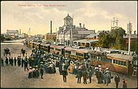 Ellen Street station, train and crowd, 1904 (colour-added, photographer-modified postcard -- SLSA B 11616).jpg