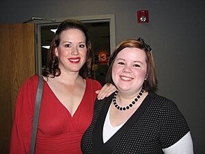 Molly Ringwald with a fan