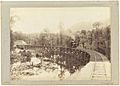 Mount Lyell railway showing train on King River Bridge. Beattie photo (c1900) (27420135590)