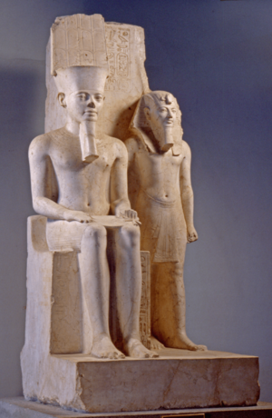 Statue of king Horemheb with the god Amun