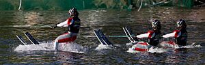 Water skier rising out of water