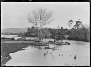 Wharf and small jetty on Lake Taupo at the point where the Waikato River leaves the lake ATLIB 313225