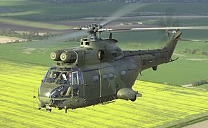 A Royal Air Force Puma helicopter over the English countryside
