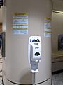 Hand sanitizer and signs at Los Angeles International Airport