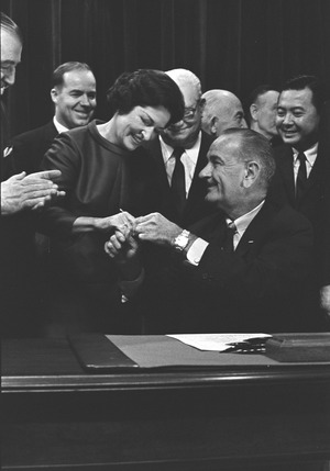 Lady Bird Johnson at the signing of the Highway Beautification Act