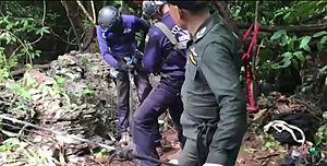 Police exploring cave opening at Doi Pha Mi