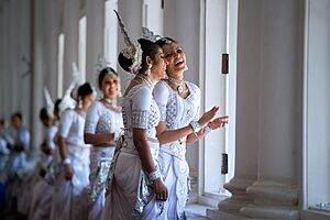 Two Women in Traditional Kandyan Dress Laugh While Waiting as Secretary Kerry Meets With Sri Lankan Foreign Minister Samaraweera (16720359423)