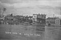 A carriage shop was one of the many businesses damaged when the Sandusky River flooded Tiffin, Ohio in March 1913.