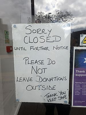 COVID closure sign at Sense charity shop UK
