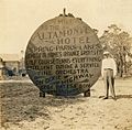 Herbert E. Fuller standing next to an Altamonte Hotel sign