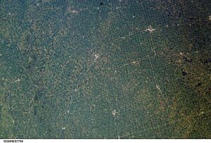 ISS005-E-7759 view from Ida Grove to Harlan and from Salix to Adair in western Iowa