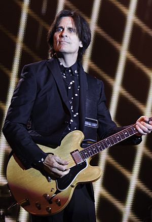 Paul McCartney - Out There Concert - Rusty Anderson 2014(cropped).jpg