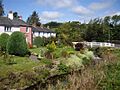 Streamside gardens in Caldbeck - geograph.org.uk - 549486