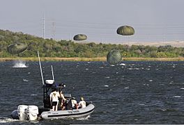 U.S. Soldiers from Charlie Company, 1-19th Special Forces Group, 71st Battlefield Surveillance Brigade, the 147th Air Support Operations Squadron and the 249th Quartermasters Company land in Walter E. Long Lake 120908-A-XN953-660.jpg