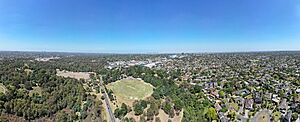 Aerial panorama of Heidelberg facing the Melbourne skyline. February 2024